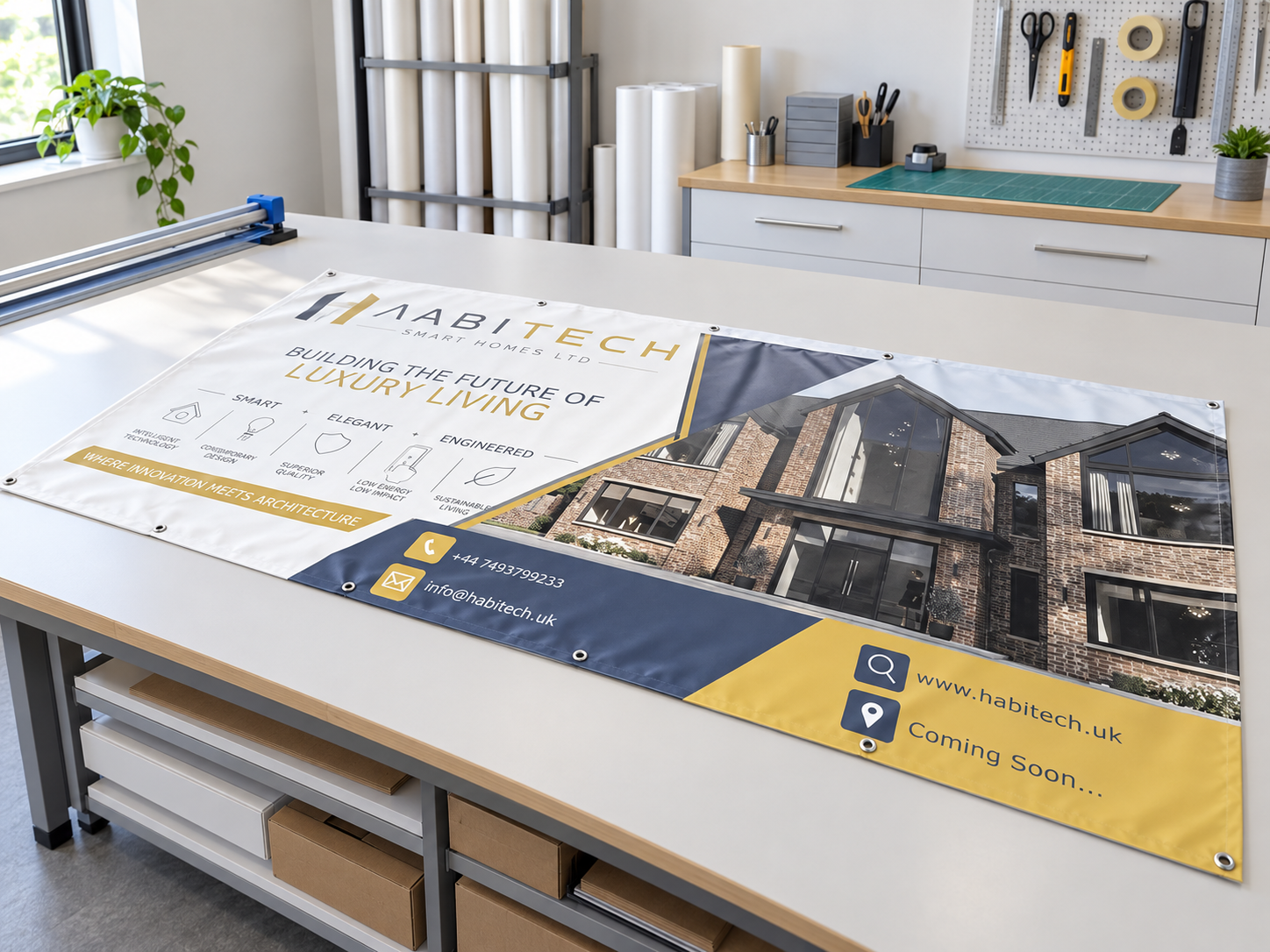 Habitech eyeleted banner laid out on a clean finishing table