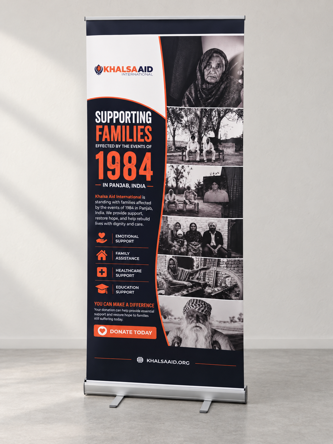 Khalsa Aid pull-up banner with orange and black campaign artwork
