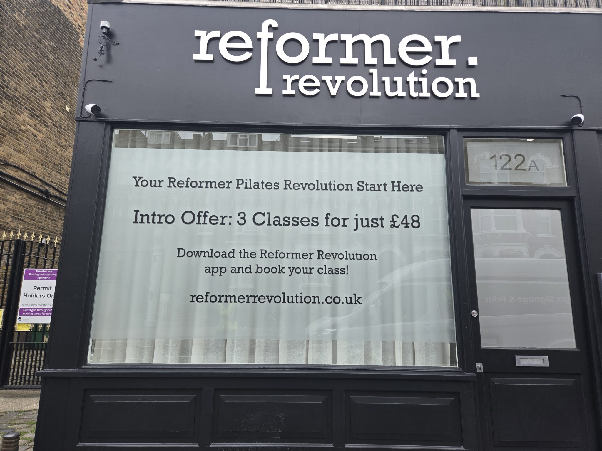Reformer Revolution Pilates studio in Tufnell Park with fascia lettering and frosted window graphics